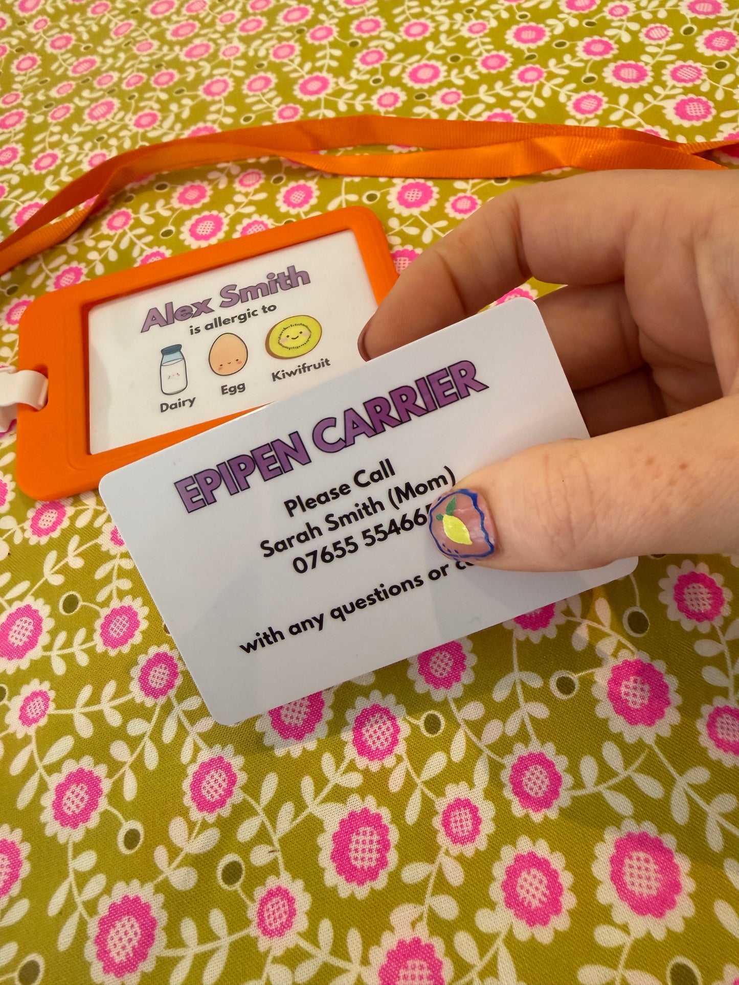 Allergy alert card with food allergen symbols on a floral background